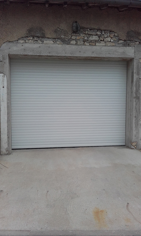 Porte de garage de type vertical roulant